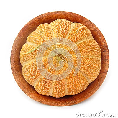 Cantaloupe muskmelon in wooden dish Stock Photo