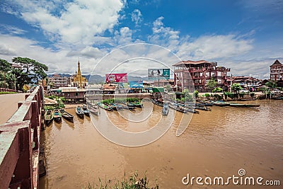 Inle Boat Station in Inle Nyaung Shwe Canal. A series of fishing boats along the river generated by Inle Lake. Editorial Stock Photo