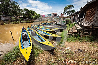 Yellow canoe boats. Inle Boat Station in Inle Nyaung Shwe Canal. Editorial Stock Photo