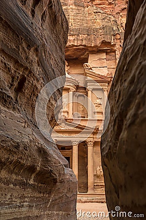 Canyon in the ancient city of Petra (Jordan) - opening view of the famous Al-Khazneh (aka Treasury) Stock Photo