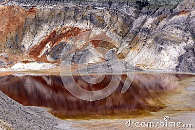 Canyon in the desert with a lake with red water Stock Photo