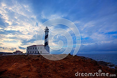 Cap de Favaritx sunset lighthouse cape in Mahon Stock Photo