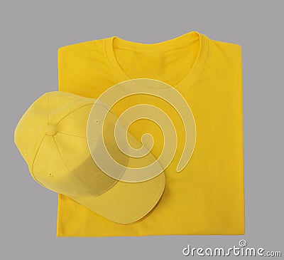 Cap and T-shirt yellow empty top view Stock Photo