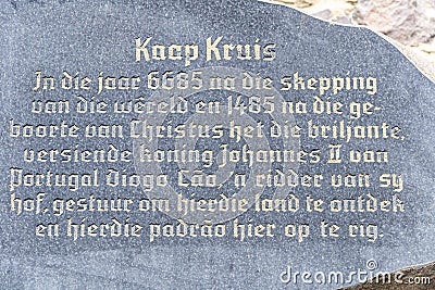 Kaap Kruis inscription in a rock, memorial of the discovery of Cape Cross in Namibia Editorial Stock Photo