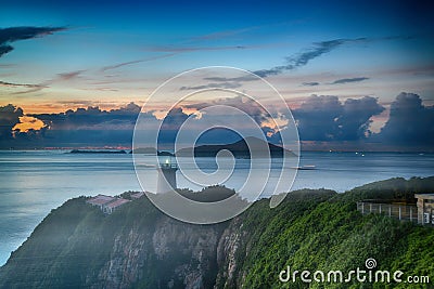 Hong Kong offshore island sunrise lighthouse Stock Photo