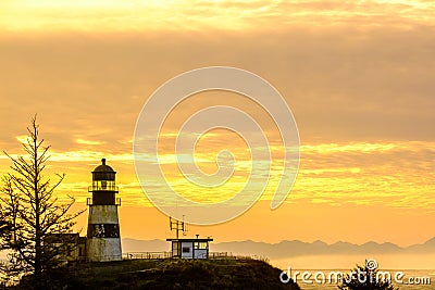 Cape Disappointment Lighthouse at sunrise, built in 1856 Stock Photo