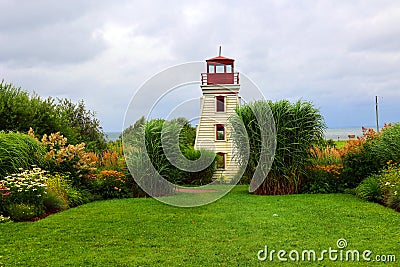 The Cape Egmont Lighthouse is a three-storey square tapered tower Editorial Stock Photo