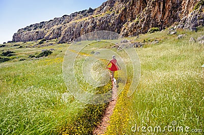 Cape Greco path girl and dog Stock Photo