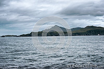 Cape Horn Lighthouse with Outpost and Chile Flag, Drake Passage Stock Photo