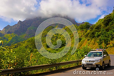 Cape Verde Mountains Landscape, Car on the Road that Cross Malagueta Sierra, Cloudy Blue Sky Stock Photo