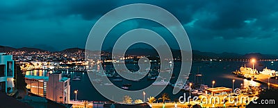 Cape Verde, Sao Vicente Island. Twilight panoramic view of Mindelo city port town with many boats in the lagoon Editorial Stock Photo