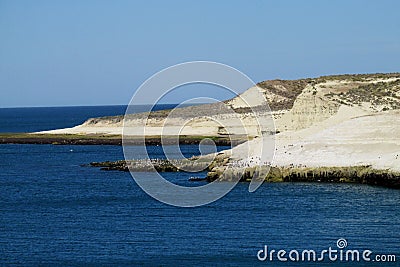 Cape with white cliffs in the ocean Stock Photo