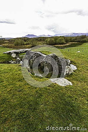 Capel Garmon Burial Chamber with Welsh Mountains in Distance Stock Photo