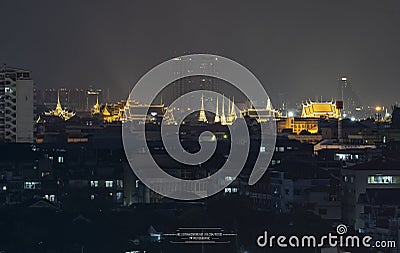The capital city of Thailand is decorated with bright lights at night. Visible from a distance Stock Photo