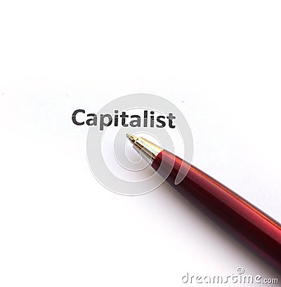 Capitalist with pen Stock Photo