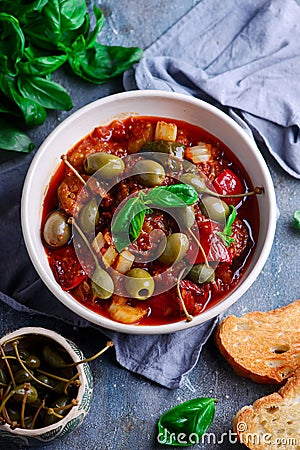 Caponata siciliana in ceramic bowl Stock Photo