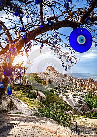 Cappadocia Uchisar castle and tree with amulets Stock Photo