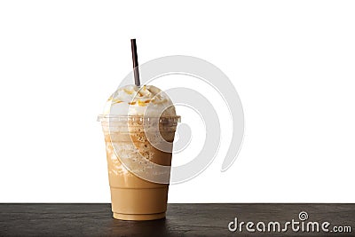 Cappuccino blended in plastic cup. Served with whipped cream. Refreshment drink. Favorite caffeine beverage Stock Photo