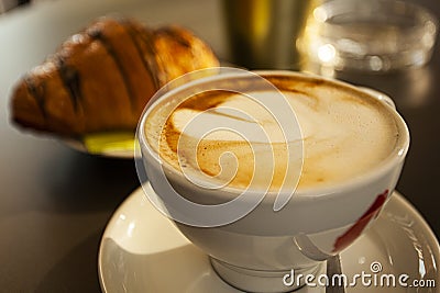 Cappuccino and brioches Stock Photo
