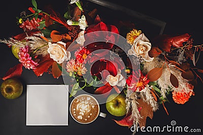 Cappuccino coffee and flowers composition on black background Stock Photo