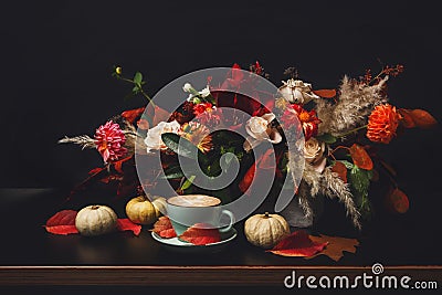 Cappuccino coffee and flowers composition on black background Stock Photo