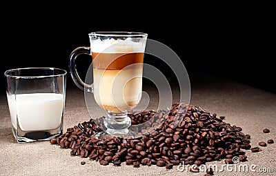 Cappuccino glass with coffee beans Stock Photo