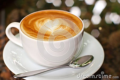 Cappuccino or latte coffee with heart Stock Photo