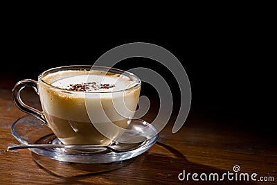 Cappuccino on wood table Stock Photo