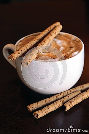 Cappucino with chocolate sticks Stock Photo