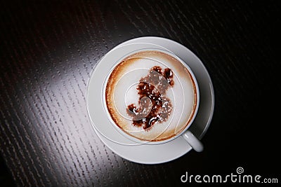 Cappucino with dollar sign Stock Photo