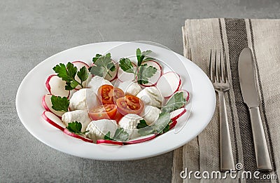 Caprese salad with mozarella cheese, tomatoes and basil Stock Photo