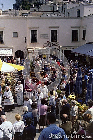 CAPRI, ITALY, MAY 1974 - The statue of San Costanzo, patron saint of the island, crosses the Piazzetta of Capri in procession Editorial Stock Photo