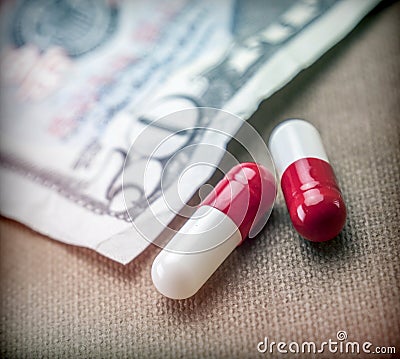 Capsules Up Ticket Dollar, Concept Of Health Copay Stock Photo