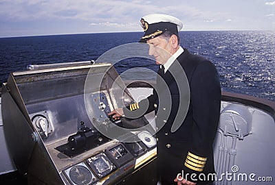 The captain of the ferry Bluenose piloting the ship through the waters between Maine and Nova Scotia Editorial Stock Photo