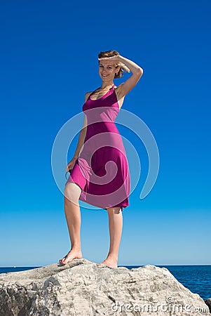 Captain girl in purple dress Stock Photo