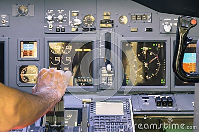 Captain hand accelerating on the throttle in flight simulator Stock Photo