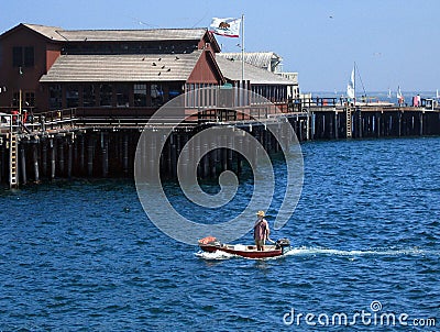 Captain and his ship Stock Photo