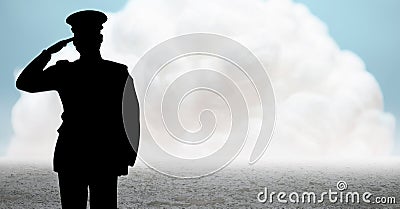 Captain silhouette saluting against cloud and ground Stock Photo