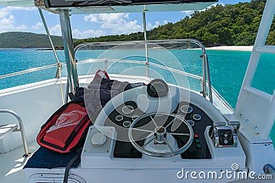 Captains bridge, deckhouse with steering wheel and controls on p Stock Photo