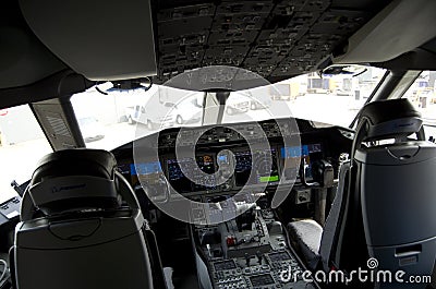 The Captains seat in the cockpit of the Boeing 787 Editorial Stock Photo