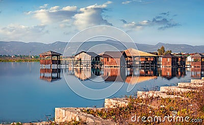 Captivating morning view of fishing dock on popular tourist attraction Patocut Laguna Stock Photo