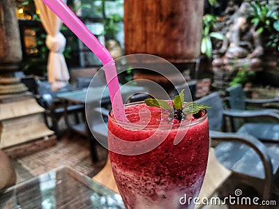 Savoring the vibrant flavors of a thai smoothie Stock Photo