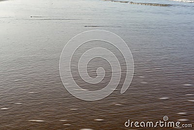 Capturing Serene Coastal Waves: Beach Bliss in Every Frame Stock Photo