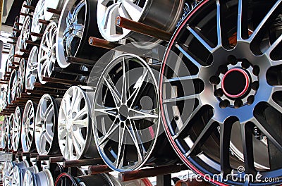 Car alloy wheel in store. Stock Photo
