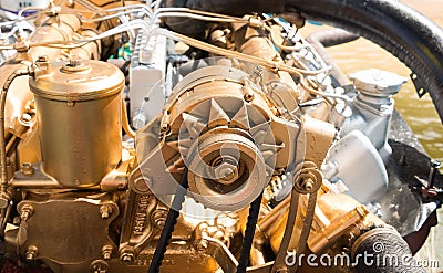 Car alternator, Converting Mechanical Energy to Electrical Energy Inside a Car. Stock Photo