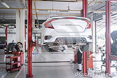 Car Auto Service and Vehicle Maintenance Workshop Center, Automobile Garage Shop and Spare Part Changing. Automotive Services Stock Photo