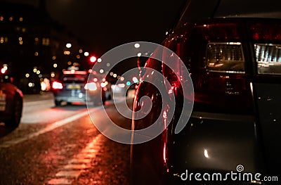 Car backlight. Bright city lights on pavment Stock Photo