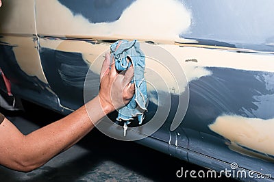 Car body work after the accident by cleaning before painting Stock Photo