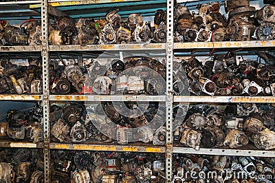 Shelf full of used engine parts Stock Photo