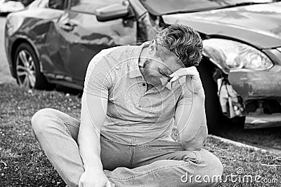 Car crash accident. Upset driver after traffic accident. Stock Photo